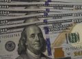 Dólar cai a R$ 5,13, e bolsa recua em dia de ajuste no mercado